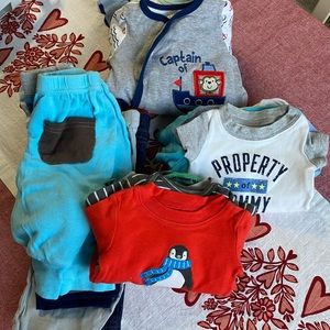 22 pieces of newborn and 0-3 month clothes